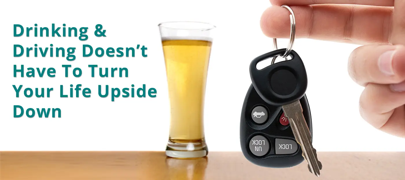 Photo of a Beer with a Person Holding Car Keys